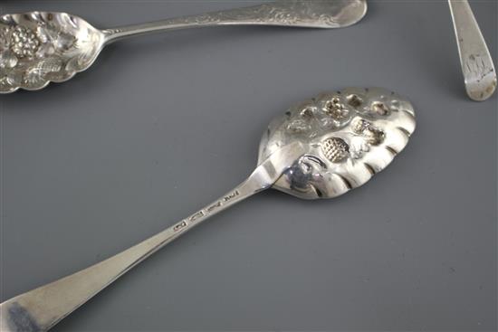 Two 18th century silver berry spoons a George III silver sauce ladle, London, 1773 and a cased silver small server, Sheffield, 190